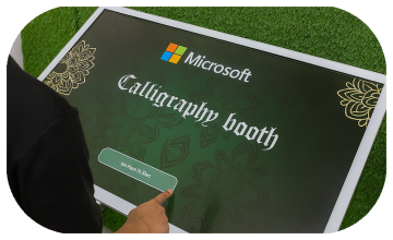 Guest receiving printed Arabic calligraphy artwork at a live event in Dubai, showcasing AI-powered personalized calligraphy in an elegant cultural setting.